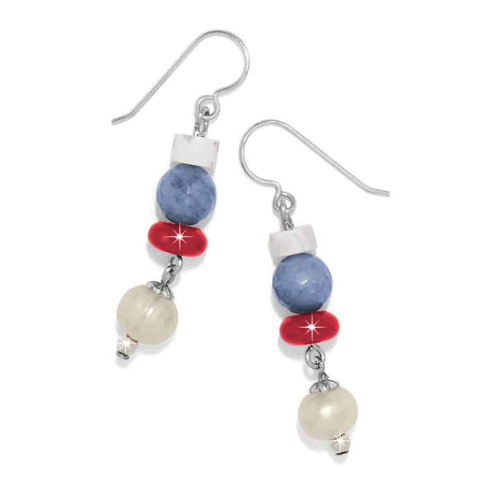 Brighton drop earrings with white, blue, red, and pearl beads and silver-plated hooks on a white background