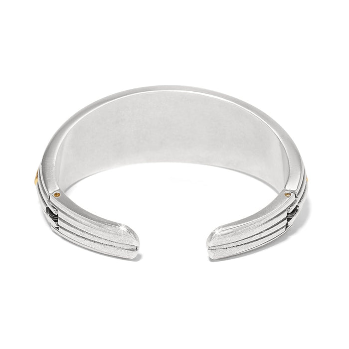 Brighton cuff bracelet shown from the back with two-tone silver and gold finish and ribbed ends on a white background