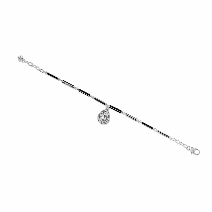 Brighton silver-plated bracelet with black enamel bars and teardrop tulip charm on a white background