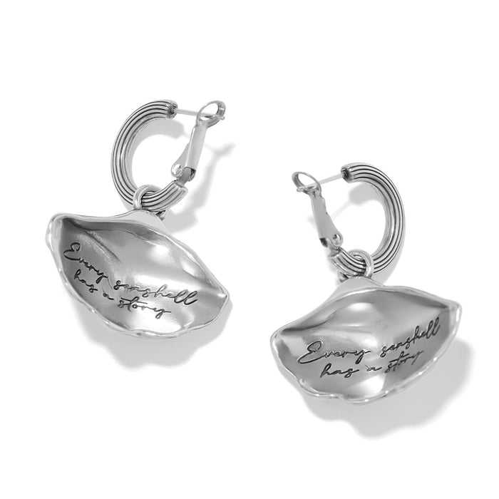 Brighton hoop drop earrings with silver-plated seashell charms engraved with cursive script on a white background