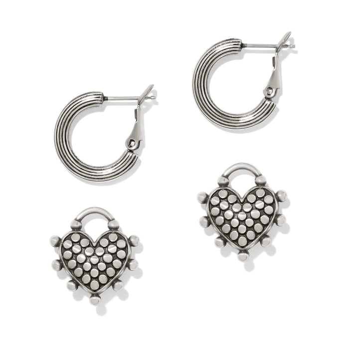 Brighton interchangeable hoop earrings with ribbed silver-plated bands and dotted heart-shaped charms on a white background
