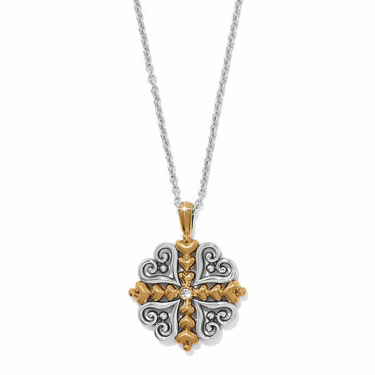 Brighton pendant necklace with two-tone scrollwork cross design and center crystal accent on a white background