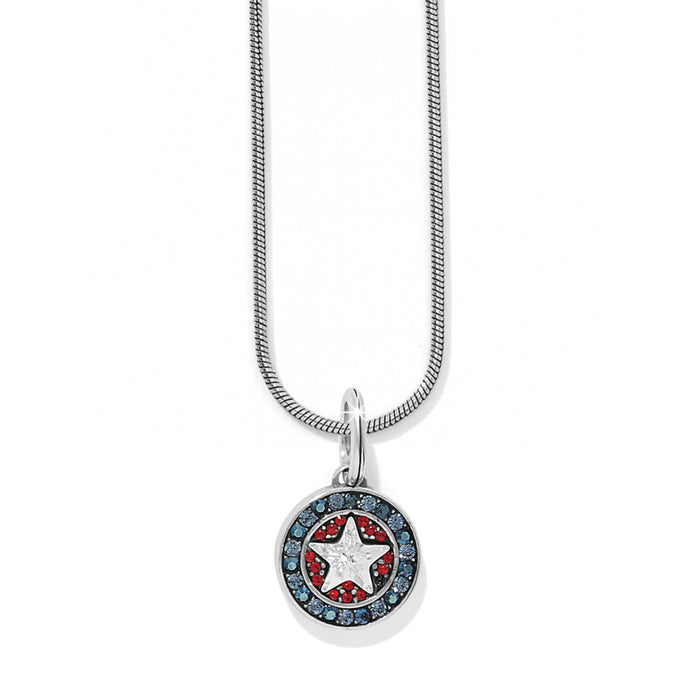 Brighton pendant necklace with silver-plated star medallion, red and blue crystals, and snake chain on a white background