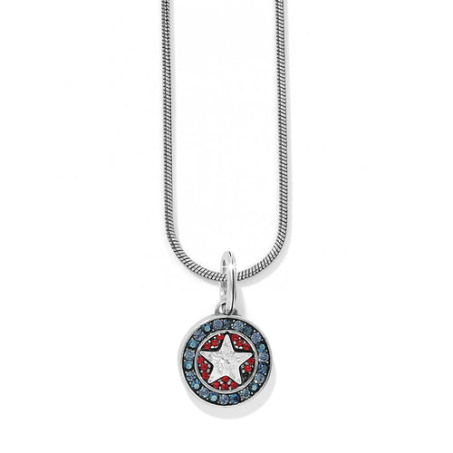 Brighton pendant necklace with silver-plated star medallion, red and blue crystals, and snake chain on a white background