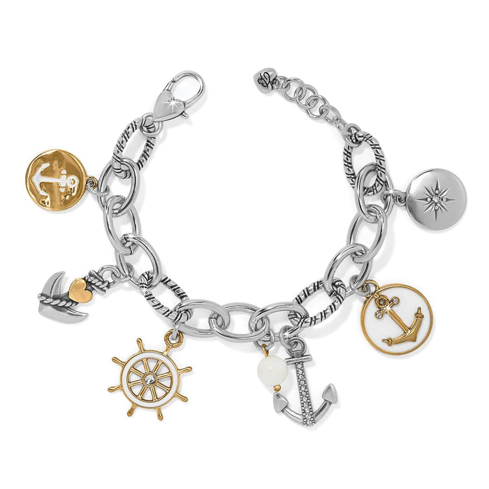 Brighton charm bracelet with two-tone nautical anchor, ship wheel, and compass charms with crystal accents on a white background