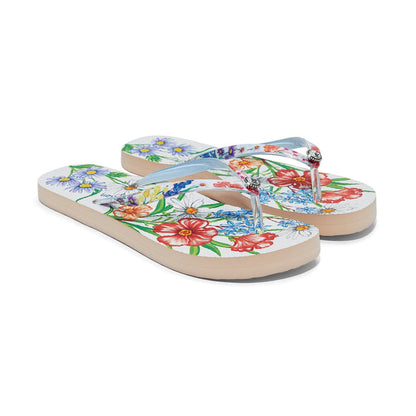 Brighton rubber flip-flop sandals with colorful floral print and clear straps with silver-tone accents on a white background