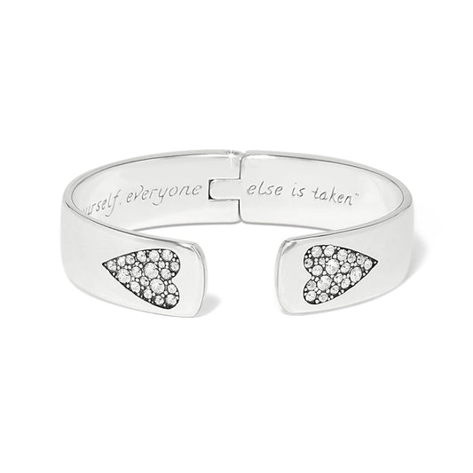 Brighton hinged cuff bracelet with silver-plated finish, crystal heart accents, and engraved interior message on a white background