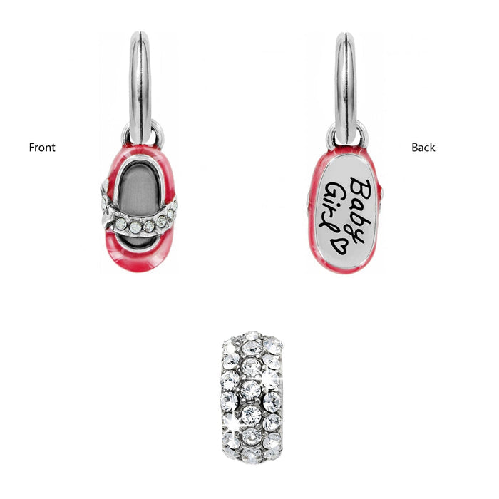 Brighton charm set with pink enamel baby shoe, Baby Girl engraving, and silver-plated crystal spacer on a white background