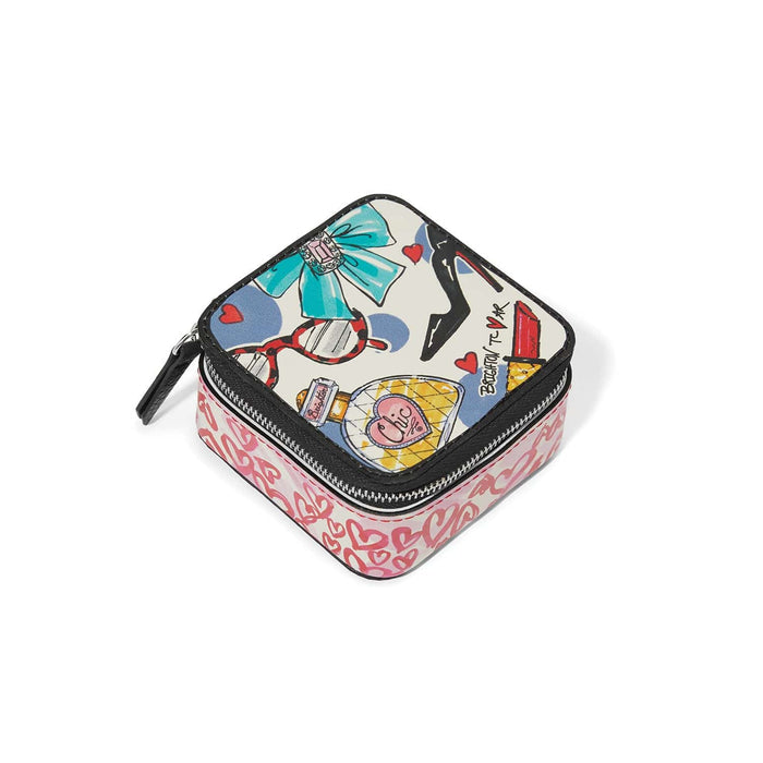Brighton zippered jewelry case with illustrated print of heels, lipstick, sunglasses, and pink hearts on a white background