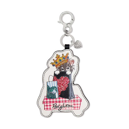 Brighton leather bag charm with illustrated kitten in crown print and shopping bags design on a white background