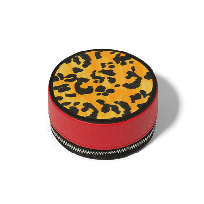 Brighton round leather zip case with yellow and black leopard print top and red sides on a white background