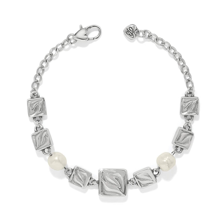 Brighton bracelet with silver-plated textured square links, barque pearl beads, and lobster clasp on a white background
