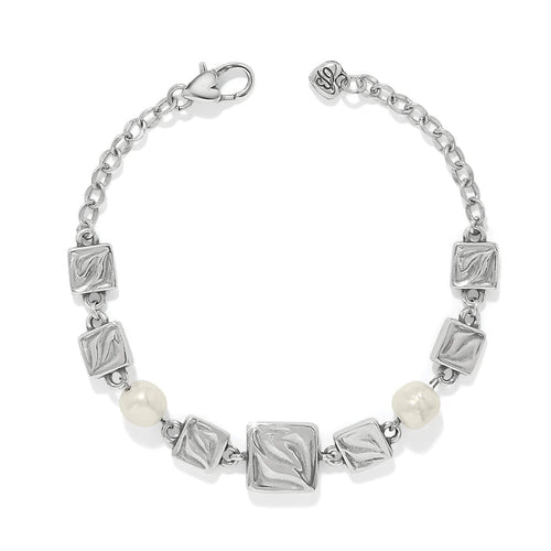 Brighton bracelet with silver-plated textured square links, barque pearl beads, and lobster clasp on a white background