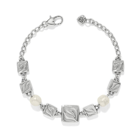 Brighton bracelet with silver-plated textured square links, barque pearl beads, and lobster clasp on a white background
