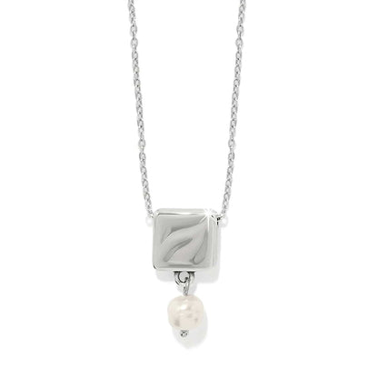 Brighton pendant necklace with silver-plated square charm and barque pearl drop on a white background