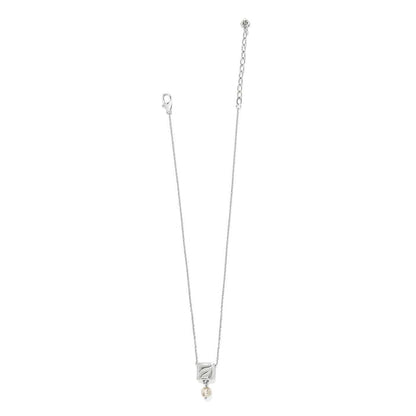 Brighton silver-plated pendant necklace with square charm, baroque pearl drop, and extender chain on a white background