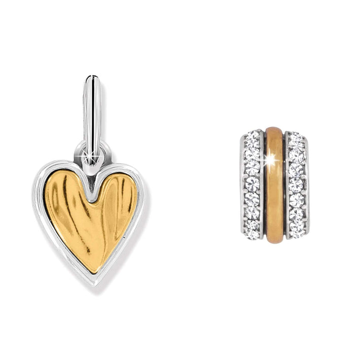 Brighton charm set with two-tone gold heart and crystal-lined band with gold center on a white background
