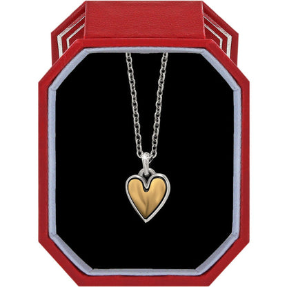 Brighton heart pendant necklace with two-tone silver and gold finish displayed in a red gift box on a white background
