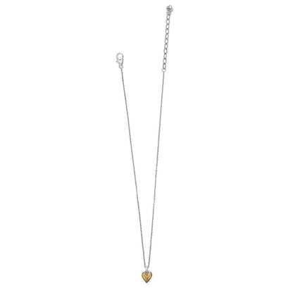 Brighton necklace with two-tone heart pendant, silver-tone chain, and lobster clasp closure on a white background