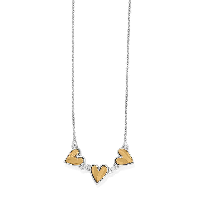 Brighton necklace with three gold-tone hearts framed in silver-tone on a delicate silver-tone chain on a white background