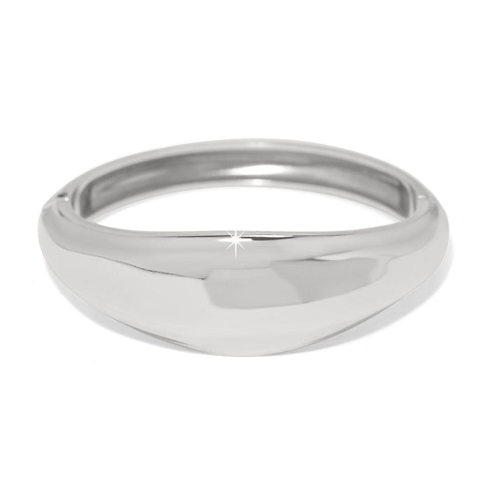 Brighton hinged bangle bracelet with smooth sculpted silver-plated finish and tapered domed front on a white background