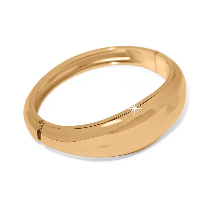 Brighton hinged bangle bracelet with smooth polished gold-plated finish and sculpted curved silhouette on a white background