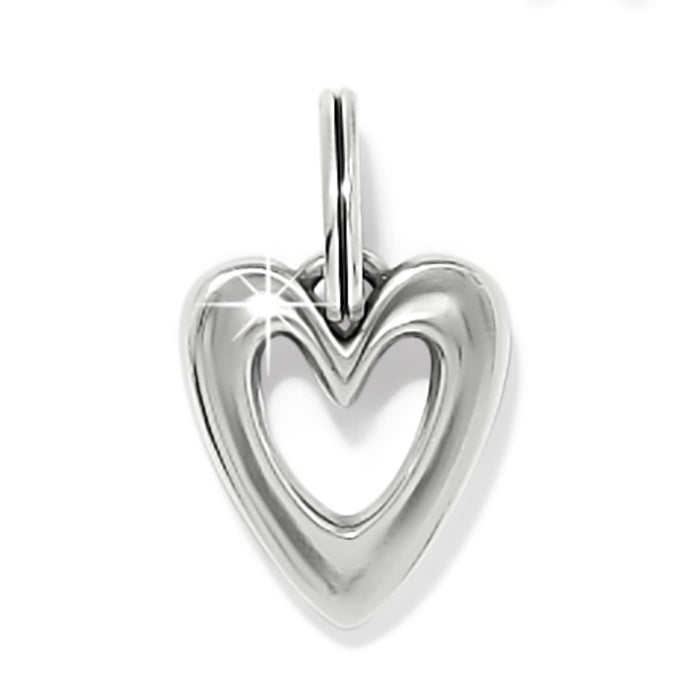 Brighton heart charm pendant with silver-plated finish and open cutout center on a white background