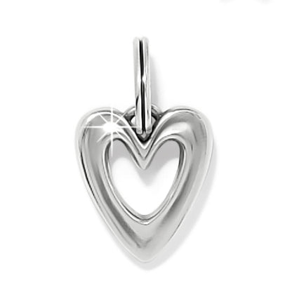 Brighton heart charm pendant with silver-plated finish and open cutout center on a white background