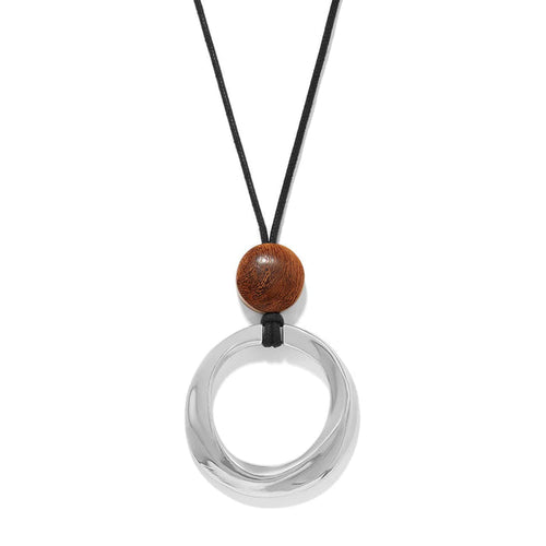 Brighton pendant necklace with silver-plated open ring, wood bead accent, and black nylon cord on a white background