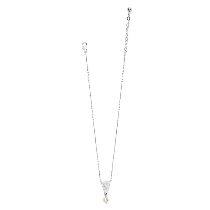 Brighton pendant necklace with silver-plated triangular charm and barque pearl drop on a white background