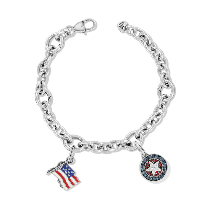Brighton silver-plated charm bracelet with American flag charm and crystal star medallion charm on a white background