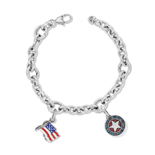 Brighton silver-plated charm bracelet with American flag charm and crystal star medallion charm on a white background