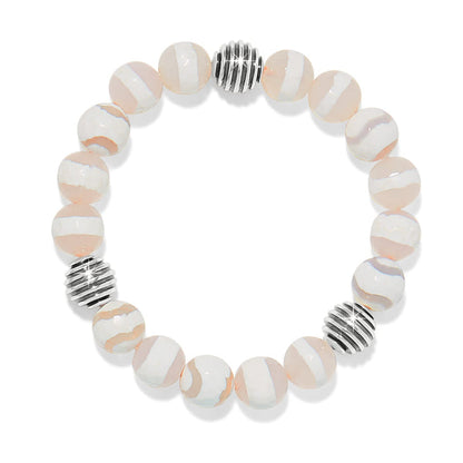 Brighton beaded bracelet with cream and white swirled beads and silver-plated ribbed accent beads on a white background