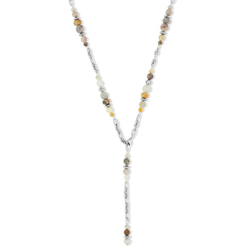 Brighton Y-drop necklace with multicolored stone beads and silver-plated chain links on a white background