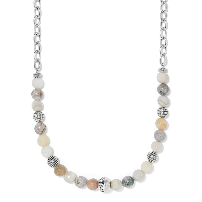 Brighton beaded necklace with cream and gray stone beads, silver-plated accent beads, and chain links on a white background