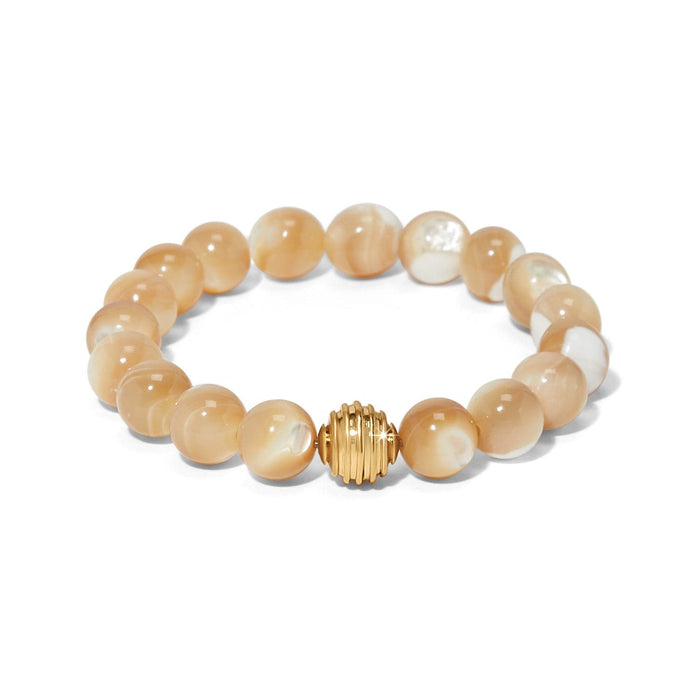 Brighton beaded bracelet with cream mother-of-pearl beads and a gold-plated ribbed accent bead on a white background