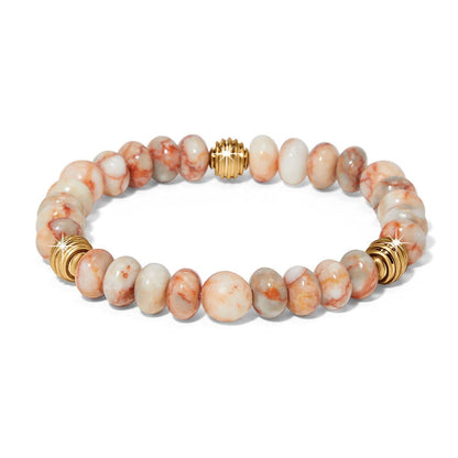 Brighton beaded bracelet with peach and cream marbled stones and gold-plated accent beads on a white background