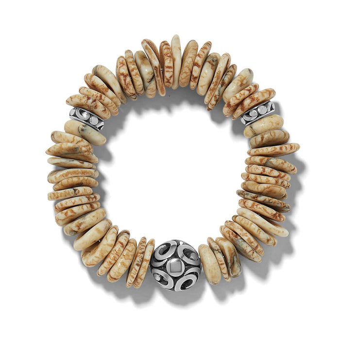 Brighton stretch bracelet with cream and brown disk beads and silver-plated ornate accent beads on a white background
