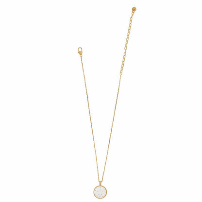 Brighton pendant necklace with mother-of-pearl sand dollar charm and gold-plated chain on a white background