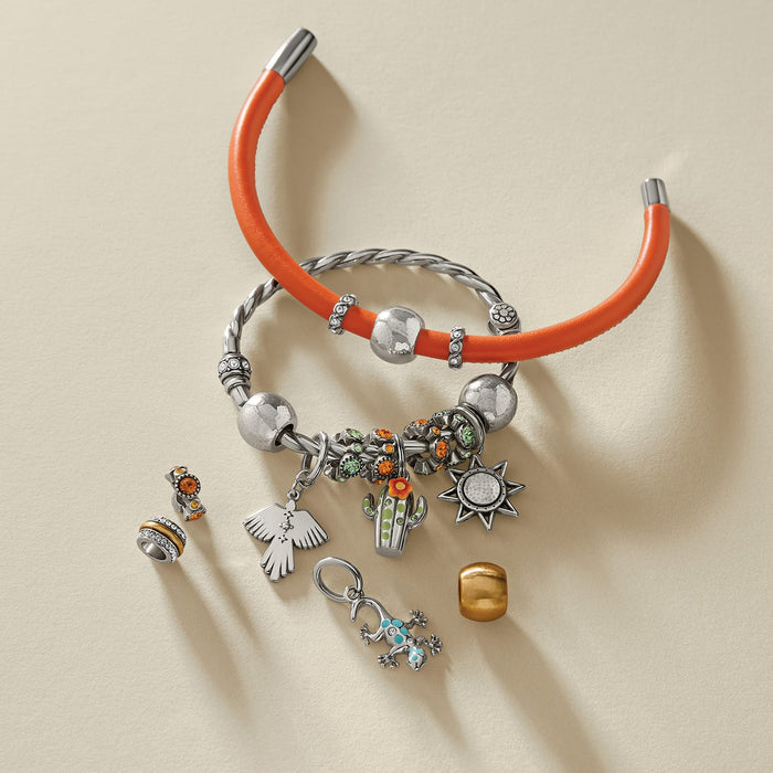 Brighton silver-plated bracelets styled with enamel charms and crystal beads including cactus, frog, and sunburst designs