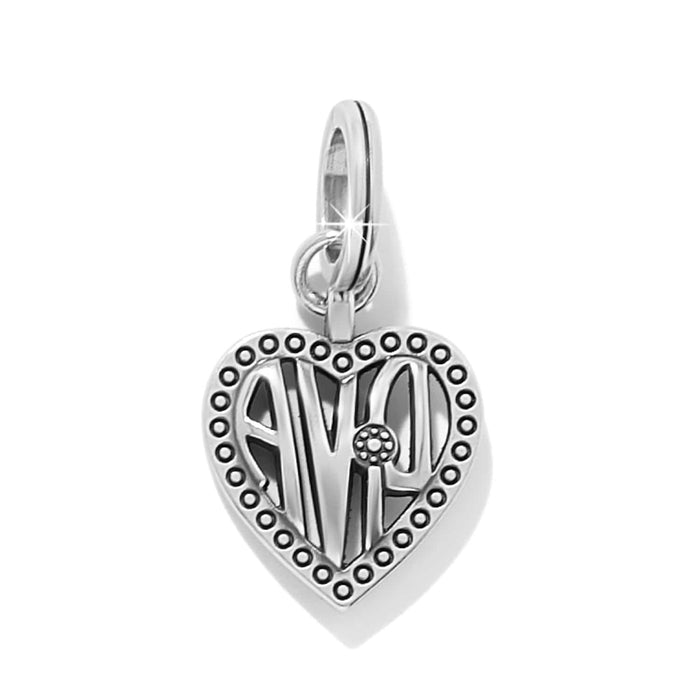 Brighton heart charm with silver-plated finish, beaded border, and engraved love motif on a white background