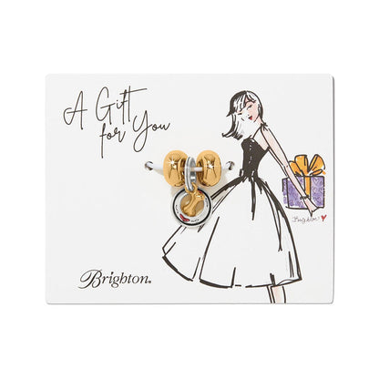 Brighton two tone charm set on illustrated gift card featuring a woman holding a purple present on white background