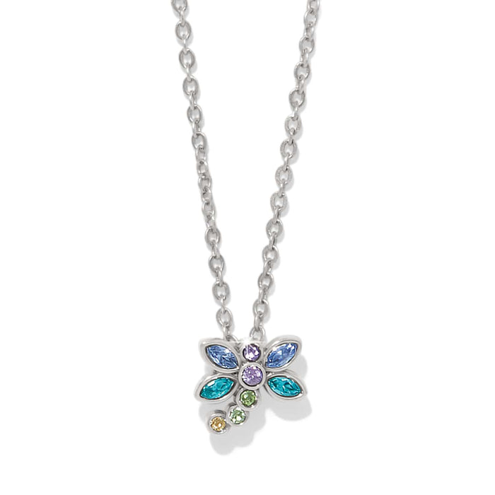 Brighton pendant necklace with silver-plated dragonfly featuring blue, purple, teal, and green crystals on a white background