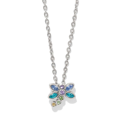 Brighton pendant necklace with silver-plated dragonfly featuring blue, purple, teal, and green crystals on a white background