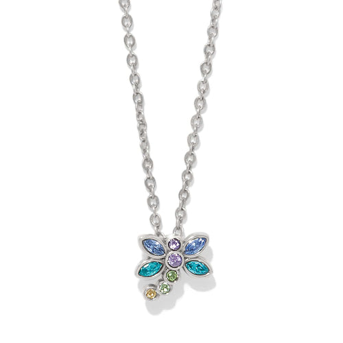 Brighton pendant necklace with silver-plated dragonfly featuring blue, purple, teal, and green crystals on a white background