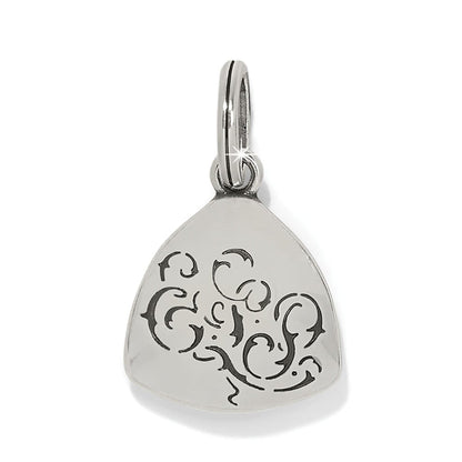 Brighton charm with silver-plated finish and engraved black scroll design on a rounded triangular shape on a white background