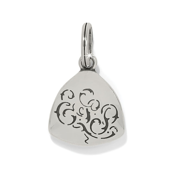 Brighton silver-plated charm with rounded triangular shape and engraved black scrollwork design on a white background