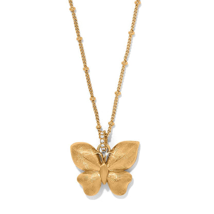 Brighton butterfly pendant necklace in gold-tone with crystal accents on bail and beaded chain on a white background