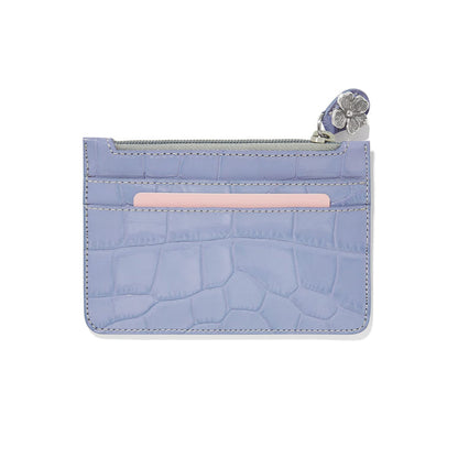 Brighton card case in lavender croc-embossed leather with zip top and silver-tone flower charm on a white background