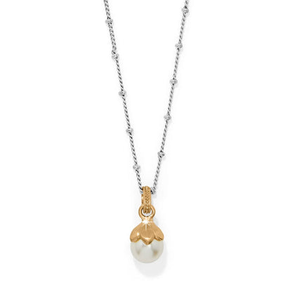 Brighton pendant necklace with fine quality glass pearl, gold plated cap, and silver-tone beaded chain on a white background